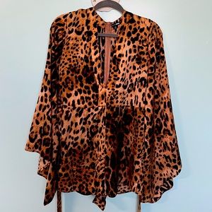 Leopard romper brown and black color